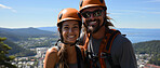 Candid shot of rock climber couple on mountain top. Extreme sport concept.