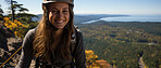 Candid shot of rock climber on mountain top. Extreme sport concept.