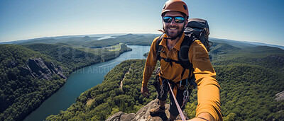 Happy rock climber taking selfie on mountain top. Extreme sport concept.