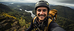 Happy rock climber taking selfie on mountain top. Extreme sport concept.