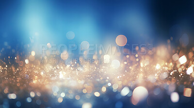 Blue and gold glitter glow particle bokeh background. Festive celebration wallpaper concept