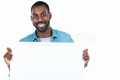 Buy stock photo Sign, portrait and happy black man with poster for mockup, marketing or advertising in studio isolated on white background. Smile, board and face of person with space for promo, commercial and banner