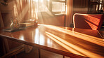Sunlight on home office desk table. Bright natural light interior design