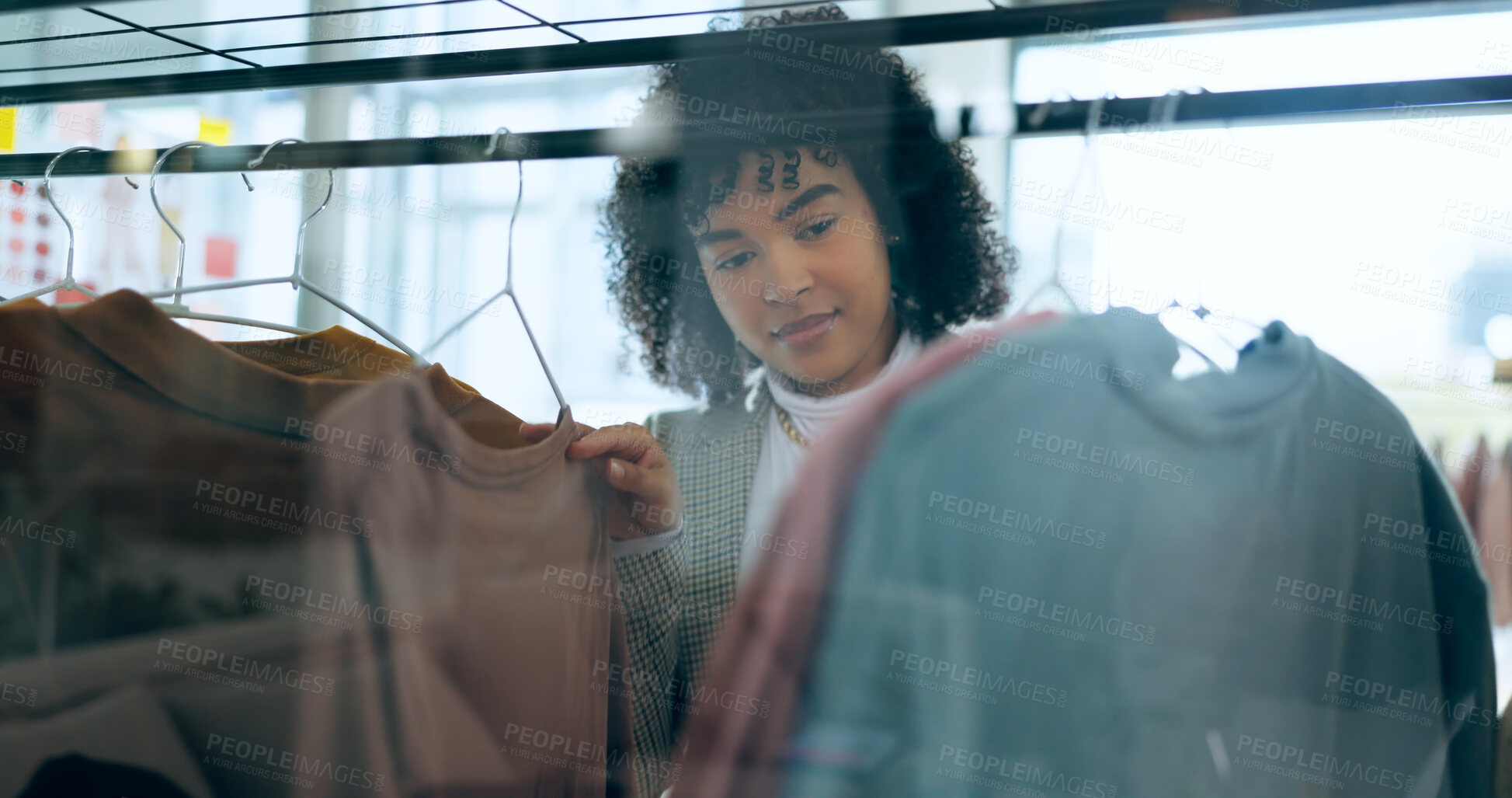 Buy stock photo Shopping, fashion and woman thinking in a mall for clothes, search or outfit choice. Retail, deal and female customer check fabric, texture or quality in a thrift store for discount, sale or decision