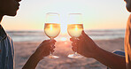 Sunset, beach and couple with wine, toast and anniversary with happiness, marriage and vacation. Romance, man and woman with alcohol, cheers or relationship with seaside holiday, lens flare or luxury