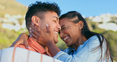 Buy stock photo Laughing, hug and a couple at the beach for a date, travel and relax together in summer. Smile, nature and a young man and woman with love, affection and care on a vacation with romance and jokes