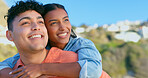 Couple, face and smile on piggyback outdoor for love, commitment and support in nature or date. People, man and woman on back with happiness, care and romance on holiday or vacation for relationship