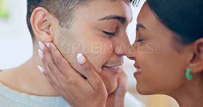 Buy stock photo Happy, couple and eskimo kiss with hug and love for affection, bonding and romantic date at home. Peace, interracial and people with commitment, loyalty and respect in healthy relationship with calm