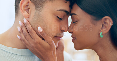 Buy stock photo Face, love and relax with a couple closeup in their apartment together for care, romance or bonding. Trust, support or commitment with a happy young man and woman in their home on the weekend