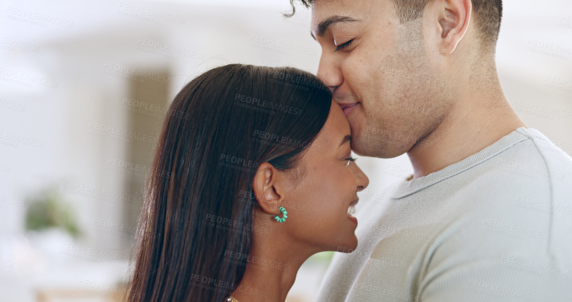 Buy stock photo Face, love and trust with a couple closeup in their apartment together for care, romance or bonding. Relax, support or commitment with a happy young man and woman in their home on the weekend