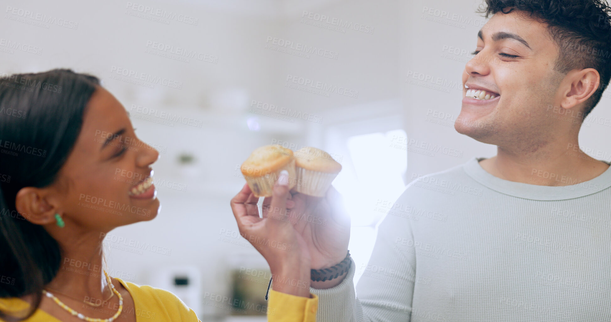 Buy stock photo Smile, couple and cheers with muffin in home, eating breakfast together in the morning and bonding. Happy man, woman and toast with cucake, dessert food and hungry for pastry, love and celebration