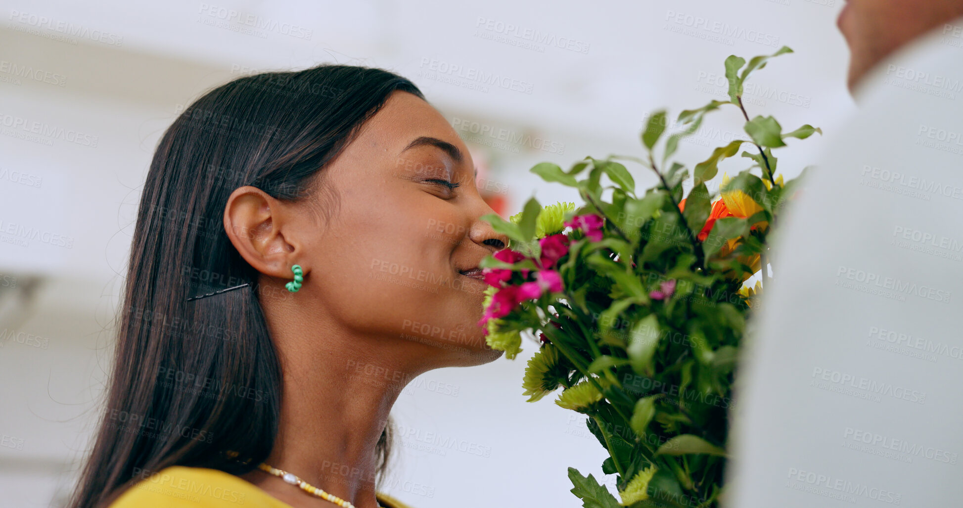 Buy stock photo Home, gift and woman smell flowers with a smile on valentines day, anniversary or surprise from partner. Happy, wife or girlfriend with flower bouquet, present and enjoying floral scent in house