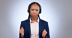 Call center, customer support and portrait of black woman on gray background talking, speaking and consulting. Telemarketing service, communication and person with headset for contact in studio