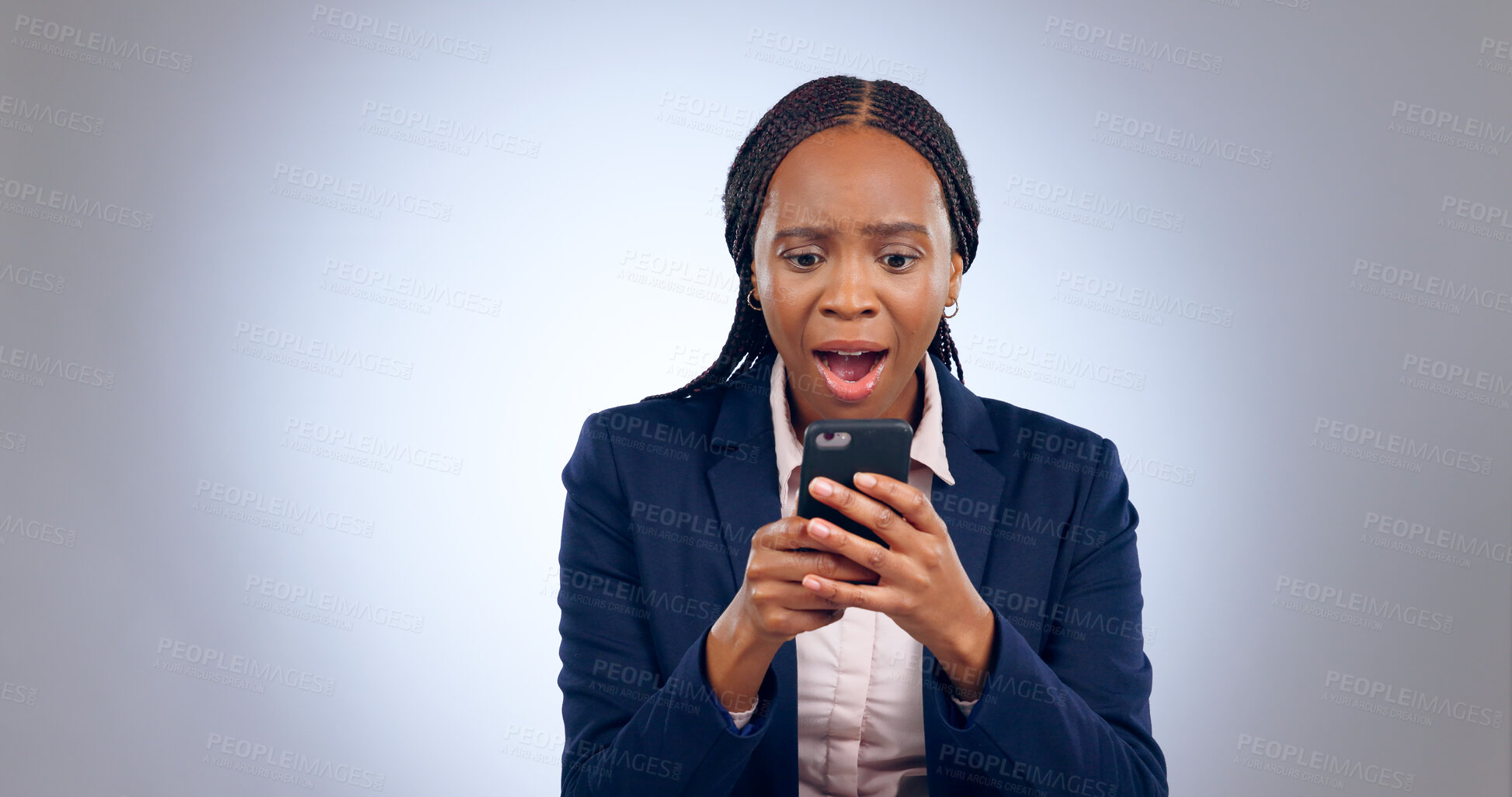 Buy stock photo Wow, phone and confused black woman with omg face in studio with fake news, review or feedback on grey background. Surprise, anxiety and African entrepreneur shocked by social media, hacker or spam