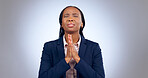 Praying, spiritual and black woman in a studio for gratitude, forgiveness and hope compassion. Blessing, religion and young African female person with prayer hand gesture isolated by gray background.