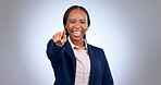 Business woman, portrait and pointing to you in studio for choice, decision and join us on grey background. Happy african worker show finger for recruitment, hiring emoji or invitation for onboarding