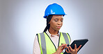 Black woman, engineer and typing on tablet in studio isolated on white background mockup space. Technology, architect and research on internet, digital app or planning construction for communication