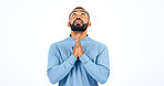 Worship, prayer and man praying in studio for thank you, faith or help on white background. Jesus Christ, hope and male model in prayer, trust or praise, gratitude or guidance, holy or gospel peace