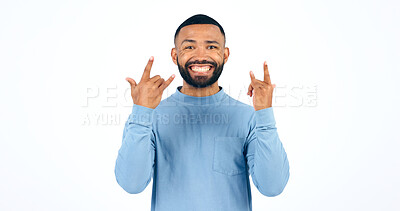 Buy stock photo Happy man, rocker and hands with smile in studio with portrait for mockup on white background. Male model, face and excited in freedom, fun or party for energy of music, sign or punk gesture in space