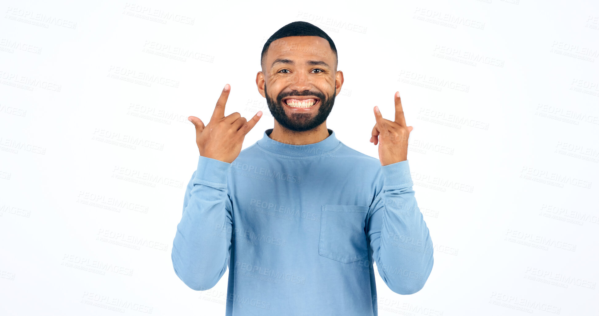 Buy stock photo Happy man, rocker and hands with smile in studio with portrait for mockup on white background. Male model, face and excited in freedom, fun or party for energy of music, sign or punk gesture in space