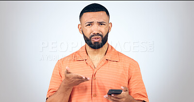 Buy stock photo Portrait of man in studio with phone, frustrated and confused with connection problem, 404 or glitch. Communication, anger and person with smartphone with scam, phishing or fraud on white background.