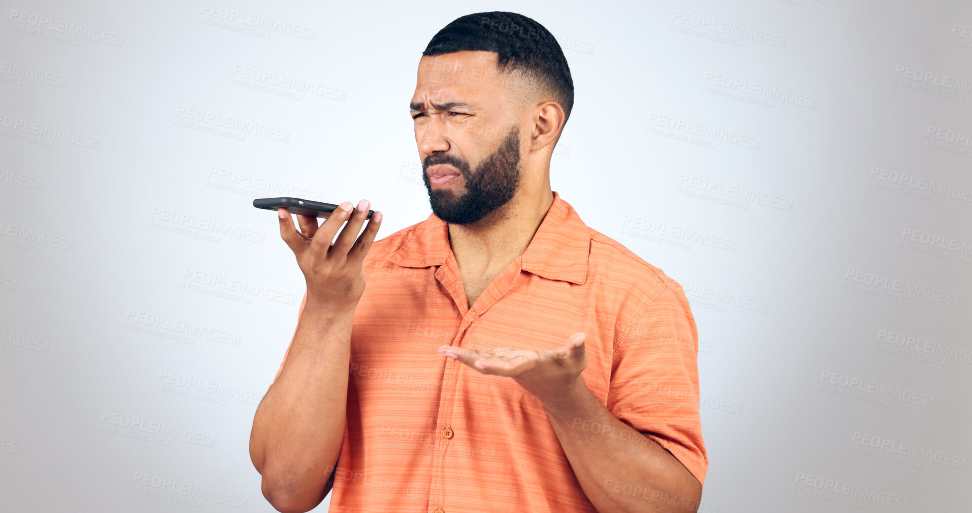 Buy stock photo Man in studio with phone, voice call and frustrated with connection problem for communication. Discussion, anger and confused person on smartphone conversation, scam or phishing on white background.