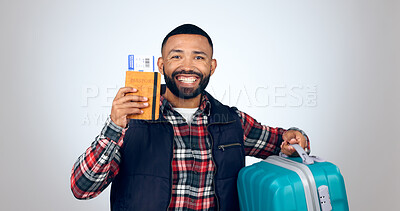 Buy stock photo Travel, portrait and man with a passport, suitcase and vacation with a smile on white studio background. Face, model and tourist with tickets, luggage and travelling with mockup space and holiday