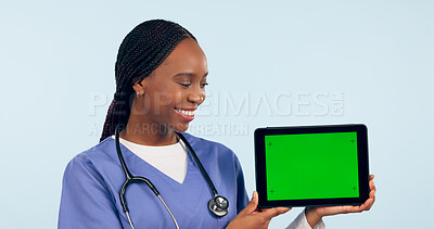 Buy stock photo Green screen, doctor and woman with tablet for telehealth, clinic promotion and medical news. Healthcare, mockup and person on digital technology for website, research and online consulting in studio