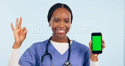 Buy stock photo Green screen, okay sign and portrait of doctor with phone for telehealth, wellness app or medical news. Healthcare mockup, clinic website and woman with approval hand emoji on smartphone in studio