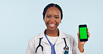 Green screen, doctor and portrait of black woman with phone for telehealth, wellness app and medical news. Healthcare, mockup and face of person on smartphone for clinic website or contact in studio