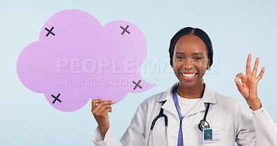 Buy stock photo Happy black woman, doctor and OK sign with speech bubble for social media review against a studio background. Portrait of African female person, surgeon or nurse showing icon, okay or emoji on mockup