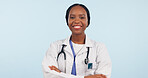 Happy black woman, portrait and professional doctor with arms crossed against a studio background. Face of African female person, surgeon or medical nurse smile in confidence for healthcare on mockup