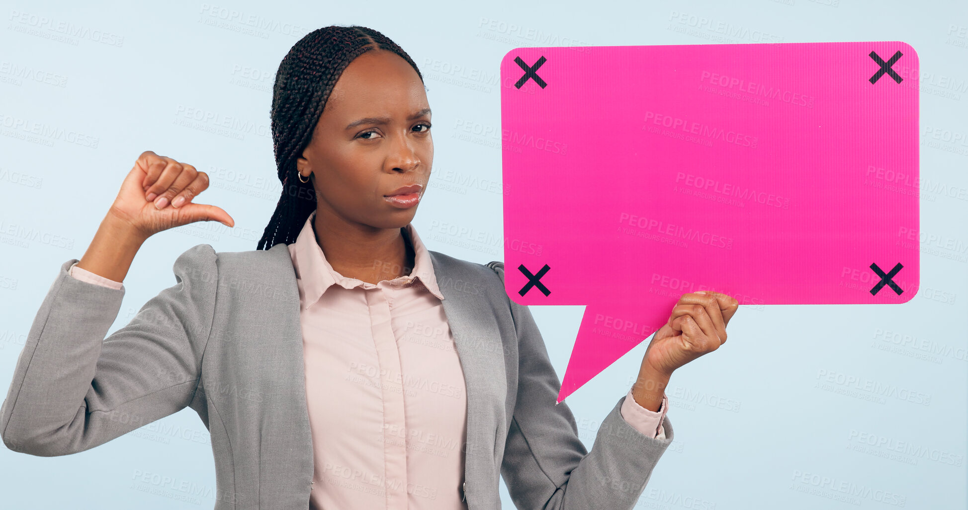 Buy stock photo Portrait, speech bubble and mockup with a business black woman pointing in studio on a gray background. Review, information or announcement and a young employee holding space with tracking markers