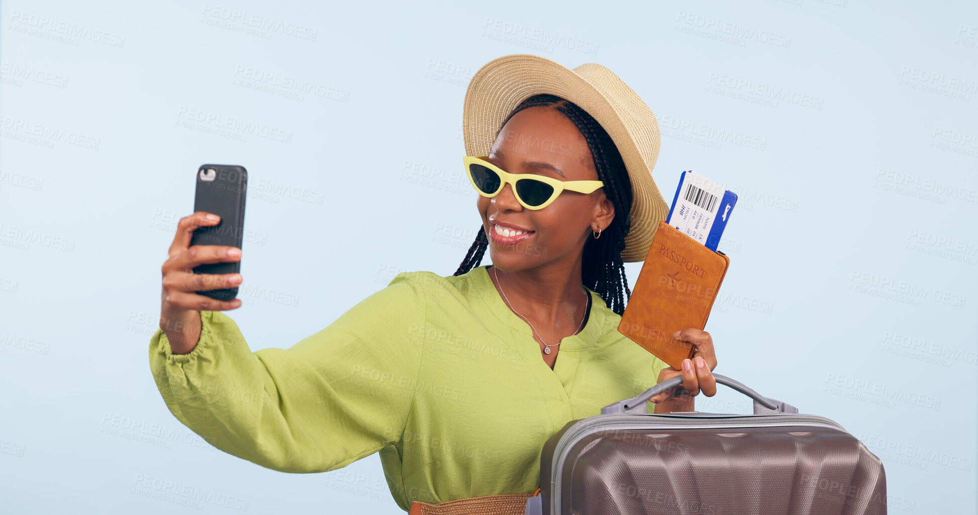 Buy stock photo Black woman, selfie with suitcase and passport for travel, vacation and social media post on blue background. Luggage, smile in picture with plane ticket and booking documents for adventure in studio