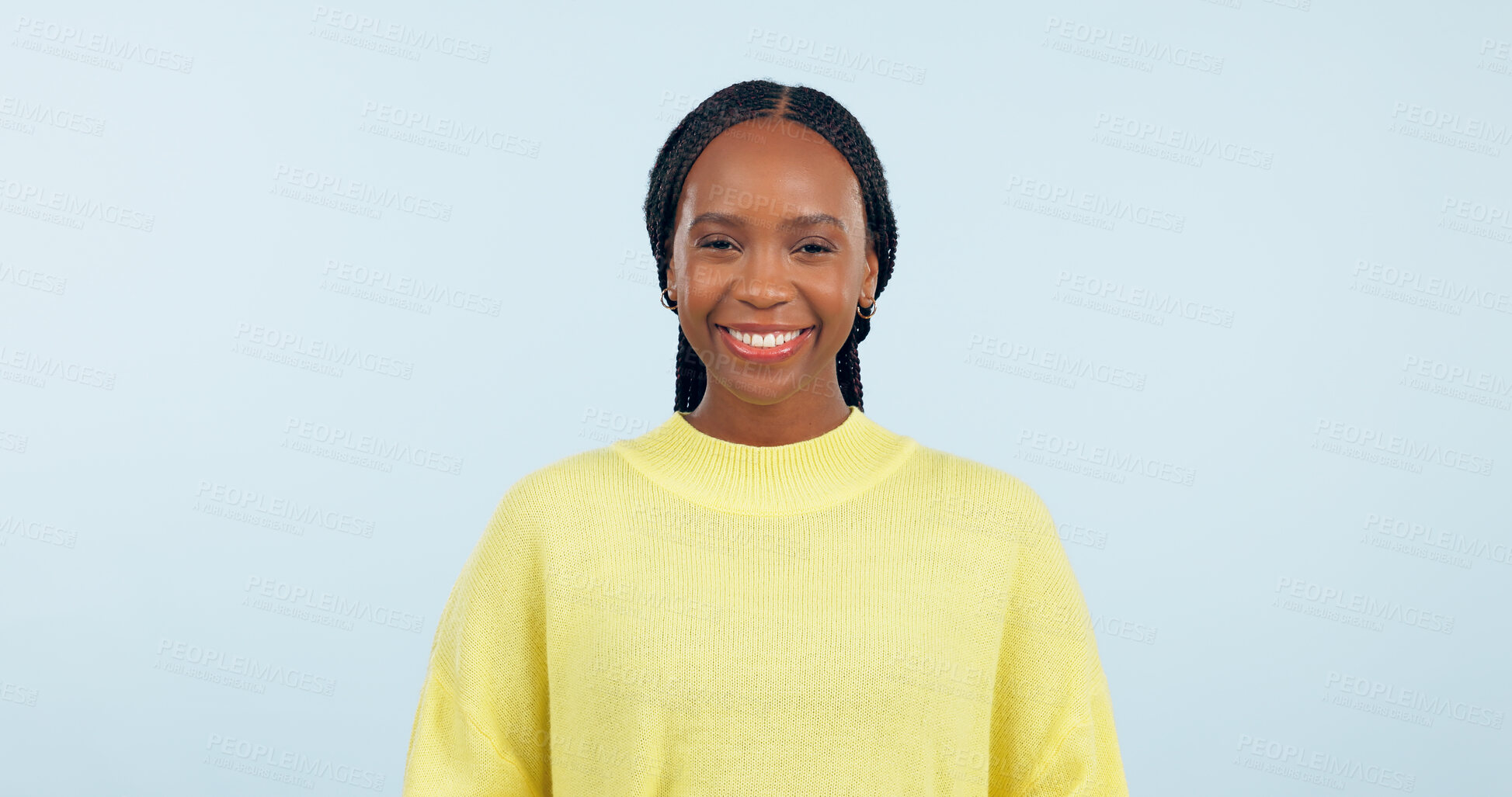 Buy stock photo Portrait, young black woman and smile in studio with confidence, good mood or casual fashion isolated on blue background. Happy gen z model with cheerful personality, pride or mockup space in Nigeria