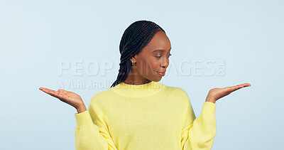 Buy stock photo Black woman, palm and advertising in choice, decision or marketing against a studio background. African female person with hands out for selection, information or showing services on mockup space