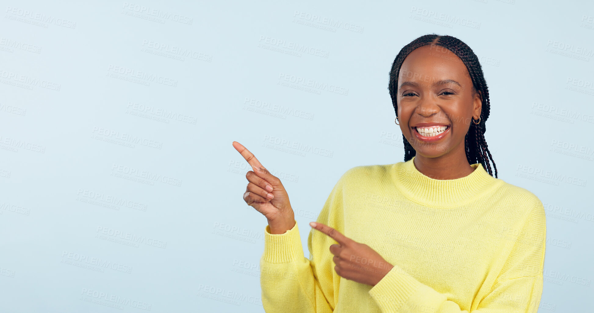 Buy stock photo Pointing, portrait and black woman with opportunity, feedback and announcement on blue studio background. African person, model or girl with hand gesture, mockup space and decision with news or smile