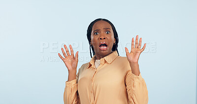 Buy stock photo Black woman, fear and shock in studio portrait for anxiety, drama or secret with hands in air by blue background. African girl, wow and scared face for alarm, surprise or mind blown with announcement