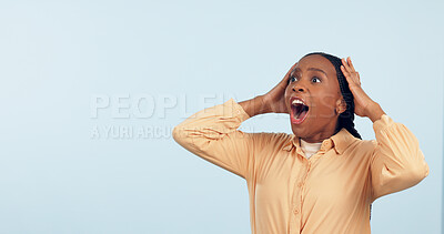 Buy stock photo Wow, space and surprise with a black woman in studio on a gray background to hear good news. Emoji, mock up and expression with a mind blown young person looking shocked by a promotion or bonus