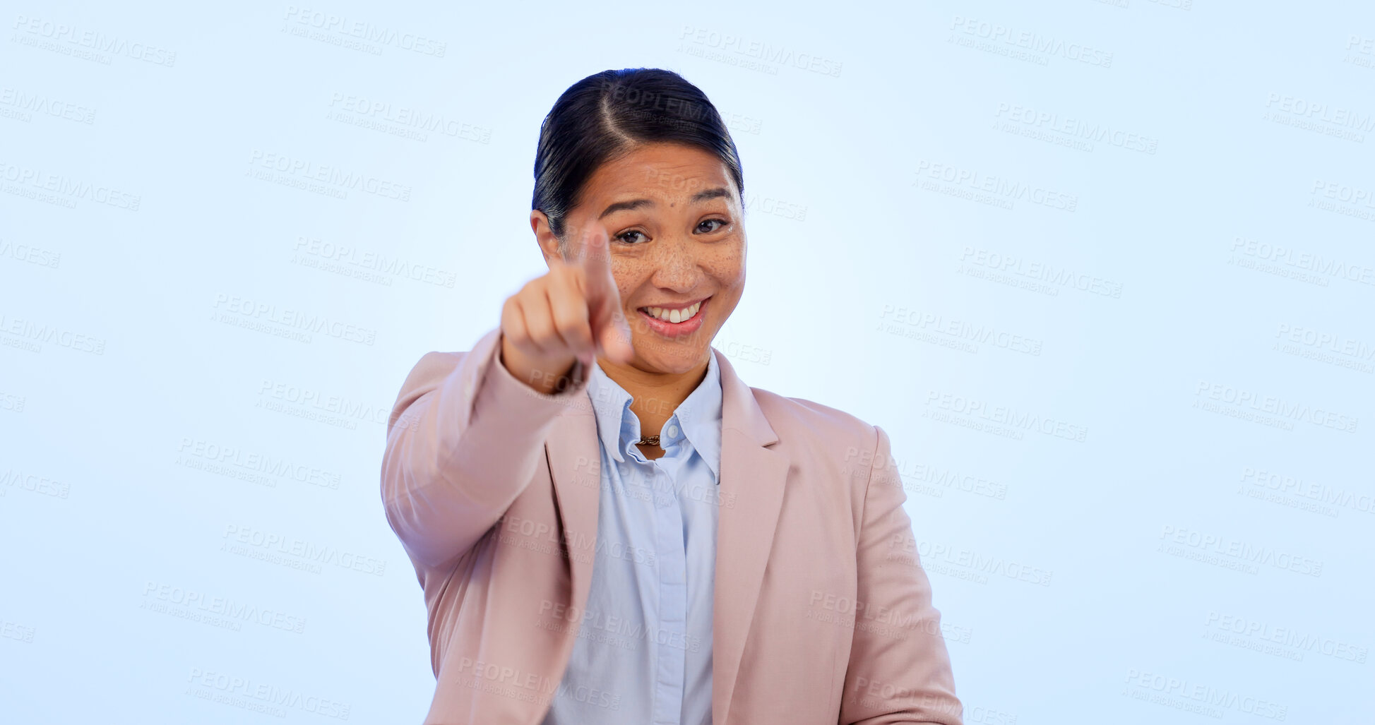 Buy stock photo Business woman, portrait and pointing to you in studio for choice, decision and vote for winner on blue background. Happy asian worker, finger and HR offer for recruitment, hiring emoji or invitation