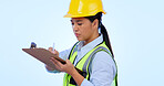 Woman, inspector and checklist or clipboard for construction, development and studio by blue background. Asian female, architecture and planning for real estate, maintenance and write in mockup