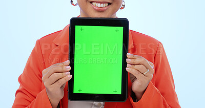 Buy stock photo Woman, hands and tablet with green screen in studio by blue background. Female model, tracking markers and chroma key on digital device, technology and display or promotion, online and mock up