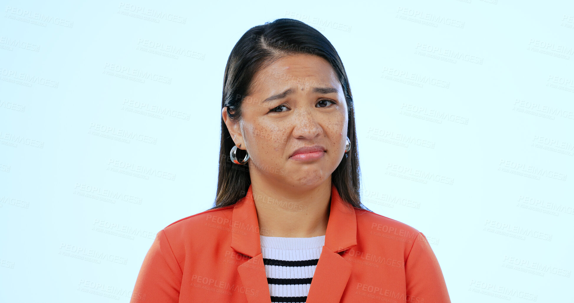 Buy stock photo Portrait, sad and woman with depression in studio isolated on blue background mockup space. Face, unhappy person and anxiety, frustrated or facial expression of stress, trauma or mental health crisis