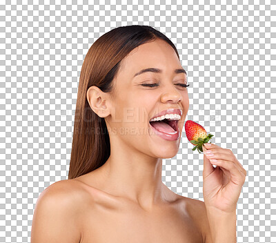 Skincare, health and female with a strawberry in studio with a wellness, natural and face routine. Happy, beauty and woman model with dermatology facial treatment eating red fruit by blue background.