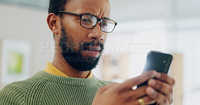 Buy stock photo Reading email, black man and a phone for communication, online chat or app notification. Home, contact and an African person typing on a mobile for a search, website or connection on the internet