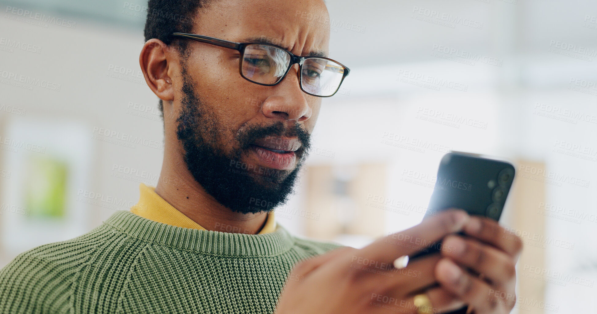 Buy stock photo Reading email, black man and a phone for communication, online chat or app notification. Home, contact and an African person typing on a mobile for a search, website or connection on the internet