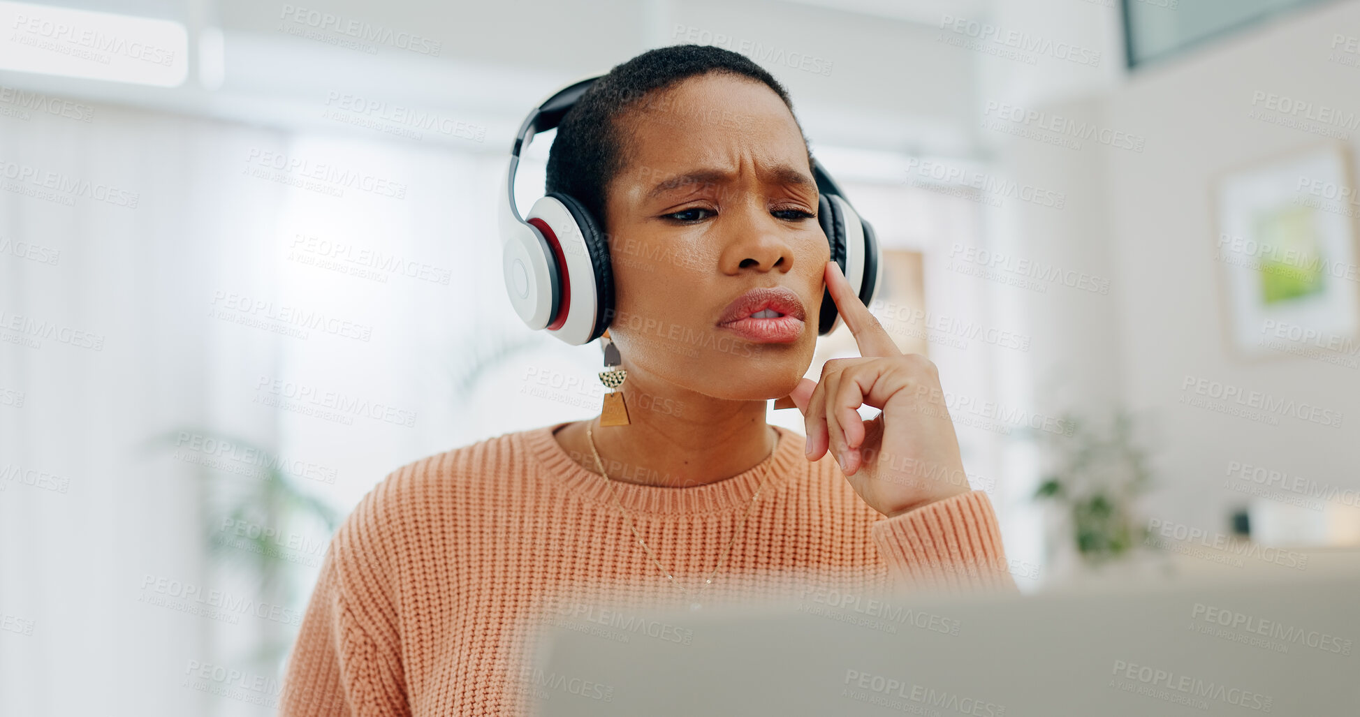 Buy stock photo Remote work, black woman and thinking on a laptop for business, online planning or a strategy. House, music and serious African freelance worker with a podcast, headphones and streaming sound on a pc
