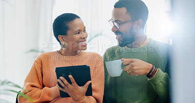 Buy stock photo Coffee, home tablet and black couple happy for social media post, morning wellness blog or relationship news. Matcha tea drink, eye contact and African man, woman or marriage people check web info