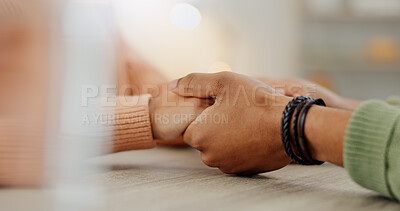 Buy stock photo Couple, closeup and holding hands with support, care or empathy for love, solidarity or consultation on table. People, conversation and bonding for kindness, together or connection for trust in house