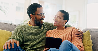 Buy stock photo Hug, home tablet and black couple happy for social media post, morning wellness blog or relationship romance. Living room sofa, eye contact and African man, woman or marriage people embrace for love